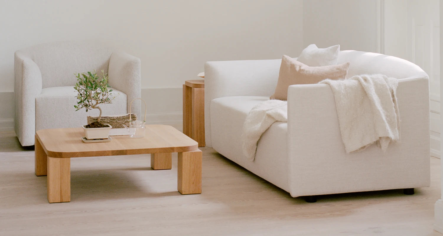 newworks_lifestyle_43521_shore_sofa_2_seater_extended_base_43511_shore_lounge_chair_extended_base_atlas_coffee_table_oak