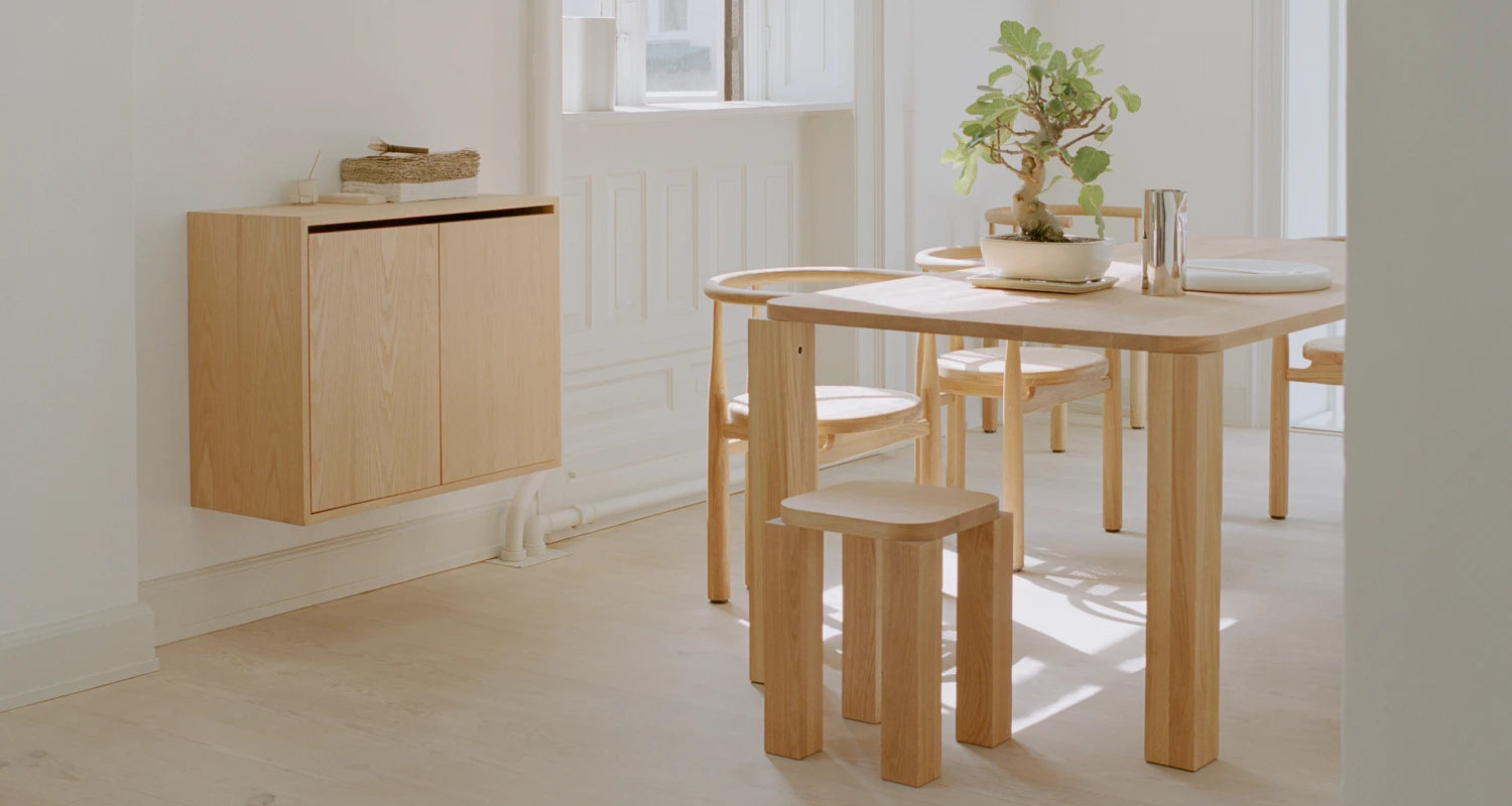 presscloud_newworks_lifestyle_42051_oak_new_works_cabinet_tall_doors_atlas_dining_table_atlas_stool_bukowski